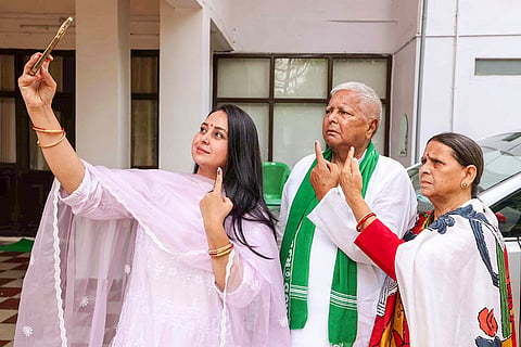 Lalu Prasad Yadav with Rabri Devi and daughter Rohini Acharya